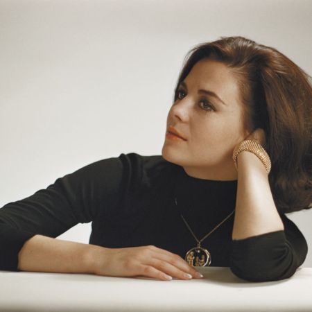Woman leaning on her arm
