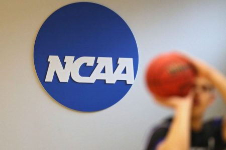The NCAA logo seen on the wall. (Patrick Smith/Getty)
