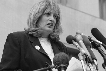Linda Tripp speaks to reporters outside the US District Courthouse in 1998. (Photo by Larry Morris/The The Washington Post via Getty Images)