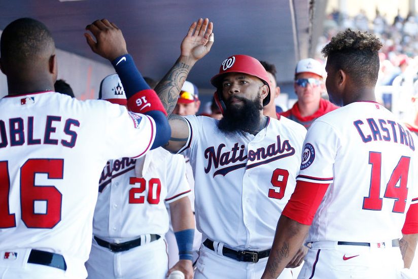 Eric Thames of the Washington Nationals celebrates with his teammates. (Michael Reaves/Getty)