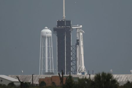 The SpaceX Falcon 9 rocket with the Crew Dragon spacecraft attached sits on launch pad 39A at the Kennedy Space Center on May 27, 2020 in Cape Canaveral, Florida. Later today NASA astronauts Bob Behnken and Doug Hurley are scheduled to liftoff on an inaugural flight and will be the first people since the end of the Space Shuttle program in 2011 to be launched into space from the United States.  (Photo by Joe Raedle/Getty Images)