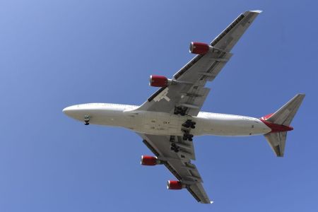 A Virgin Orbit 747-400 aircraft named 'Cosmic Girl' on final approach to Long Beach (CA) Airport, home of Sir Richard Branson's Virgin Orbit company, July 31, 2017 in Long Beach, CA.(Photo by Bob Riha, Jr.,/Getty Images)