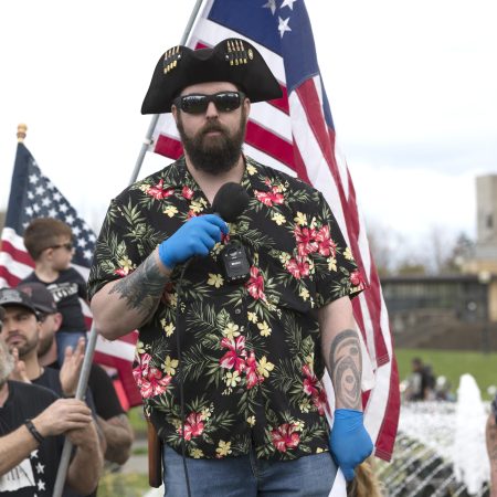 An alt-right member wears a Hawaiian shirt
