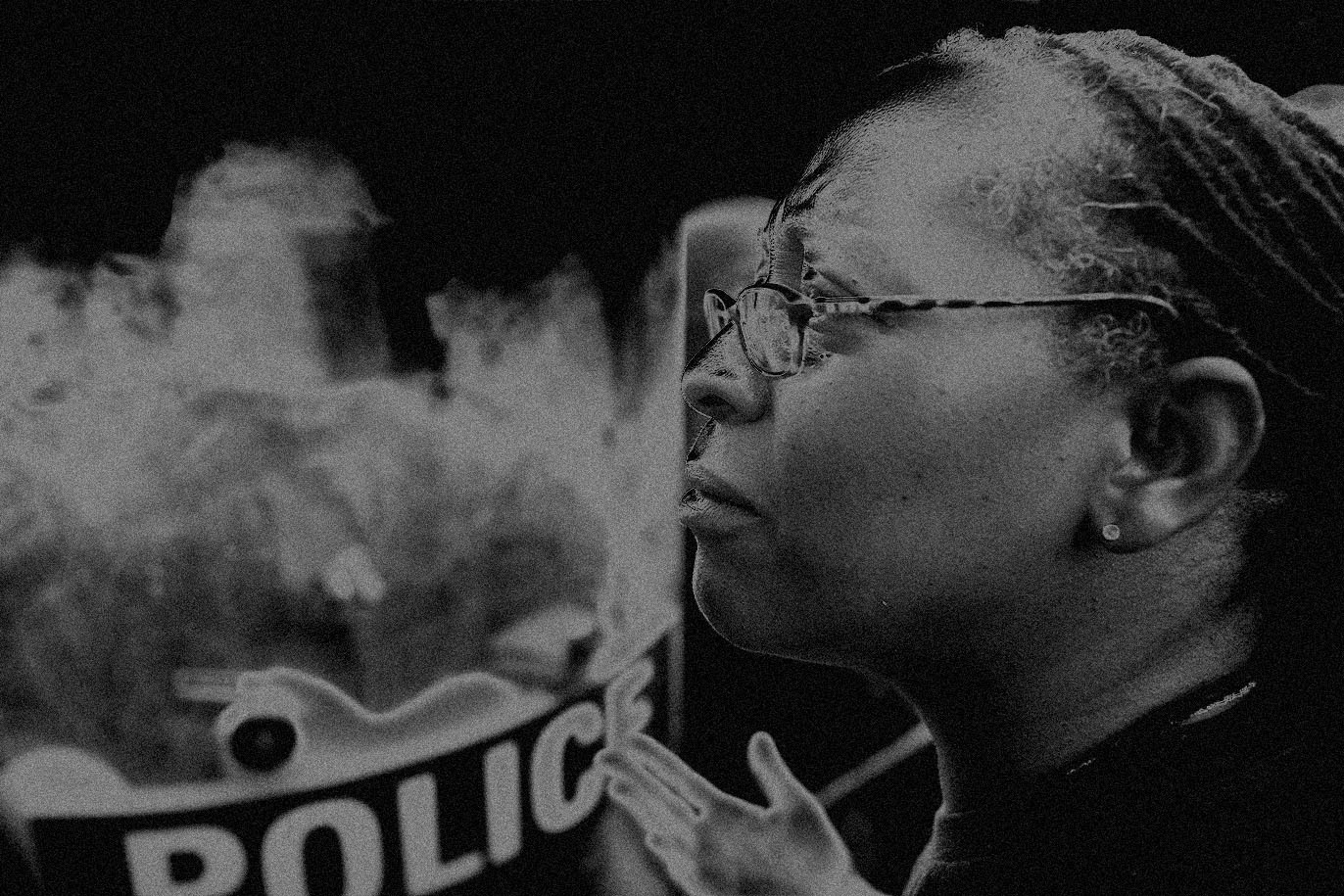 A young woman, wearing a protective mask with I CAN'T BREATHE written on it as she takes part in the fourth straight day of protests against the death of George Floyd, the African-American man killed suffocated by a Minneapolis police officer.