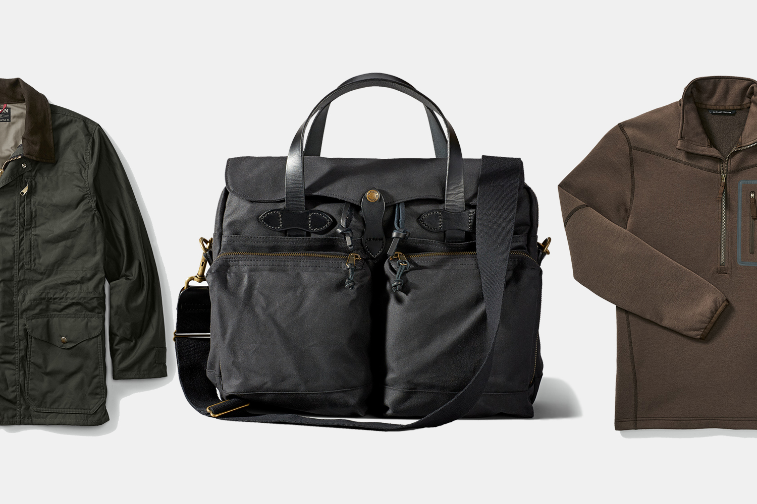 Filson waxed coat, tin cloth briefcase and fleece jacket