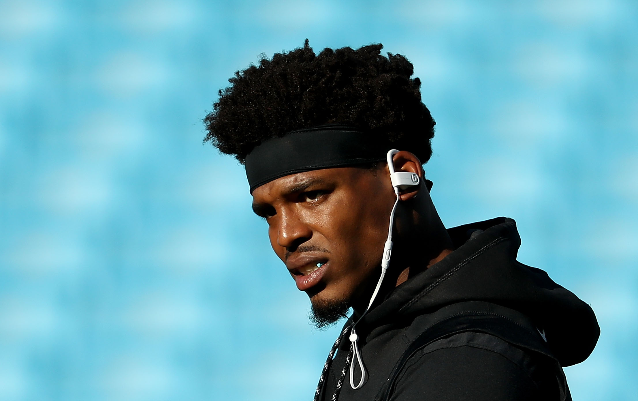 Cam Newton warms up for a game against the New England Patriots.  (Streeter Lecka/Getty)