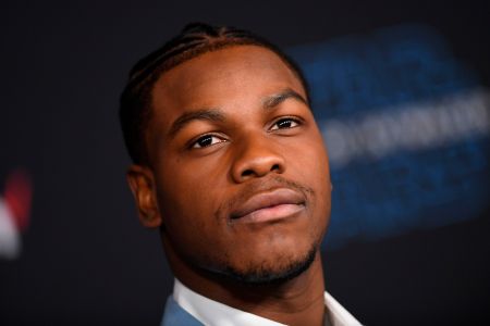 English actor John Boyega arrives for the world premiere of Disney's "Star Wars: Rise of Skywalker" at the TCL Chinese Theatre in Hollywood, California on December 16, 2019. (Photo by VALERIE MACON / AFP) (Photo by VALERIE MACON/AFP via Getty Images)