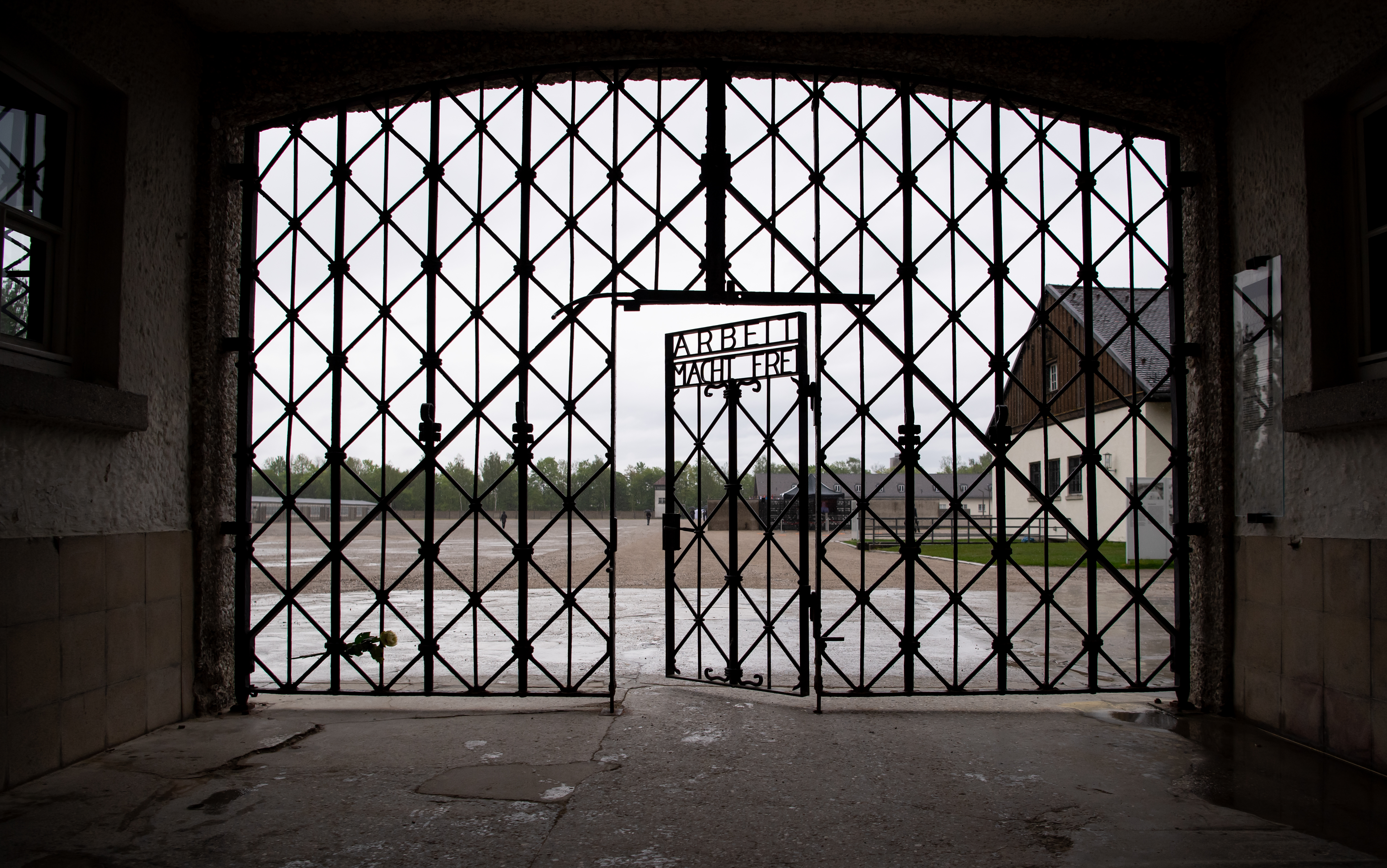 The entrance gate with the inscription "Arbeit macht frei" can be seen at the Dachau concentration camp memorial site. US soldiers liberated more than 30,000 people imprisoned in the camp on April 29, 1945. (Photo by Sven Hoppe/picture alliance via Getty Images)