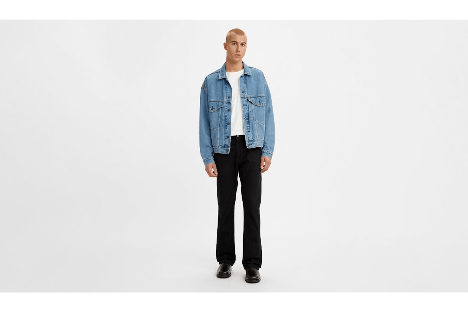 a model in a pair of Levi's jeans on a white background