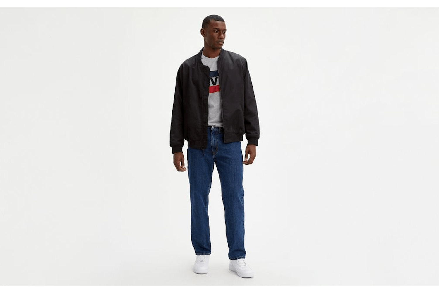 a model in a pair of Levi's jeans on a white background