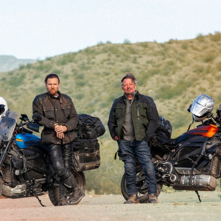 Ewan McGregor and Charley Boorman next to electric Harley-Davidson LiveWire motorcycles in "Long Way Up"