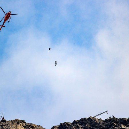 Tom Cruise comes off a motobike during the filming of the next Mission Impossible film in Hellesylt, Norway on September 6, 2020