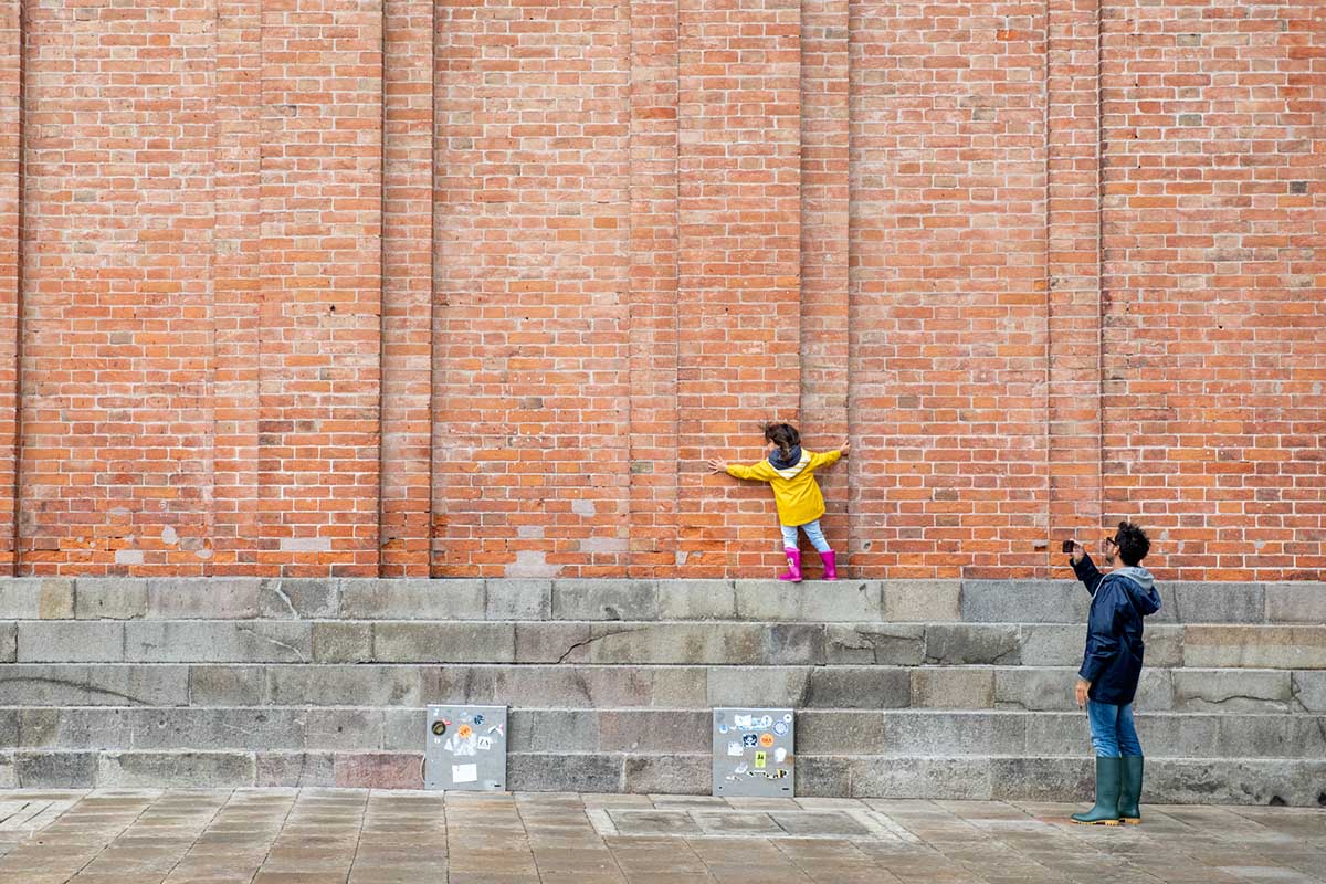 girl in a yellow raincoat in venice