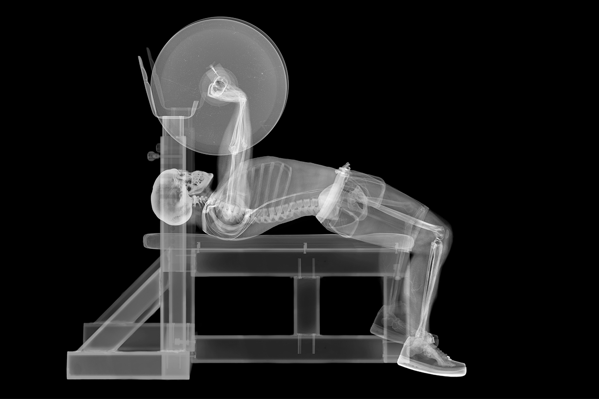 xray of man bench pressing