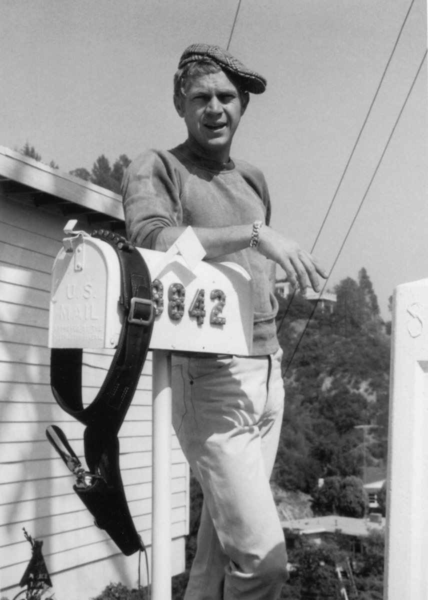 “Here’s a rare and relaxed photo of McQueen standing in front of his home mailbox at 8842 Skyline Drive in Laurel Canyon, Los Angeles,” Terrill says. “The 883-square-foot home was built in 1952. At the time, McQueen was starring in CBS’s <em>Wanted: Dead or Alive</em> and trying to make the jump to movies.”