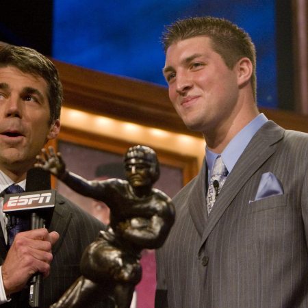 Luke Bryan Buys, Curses Tim Tebow's Heisman Trophy Prior to Georgia-Florida