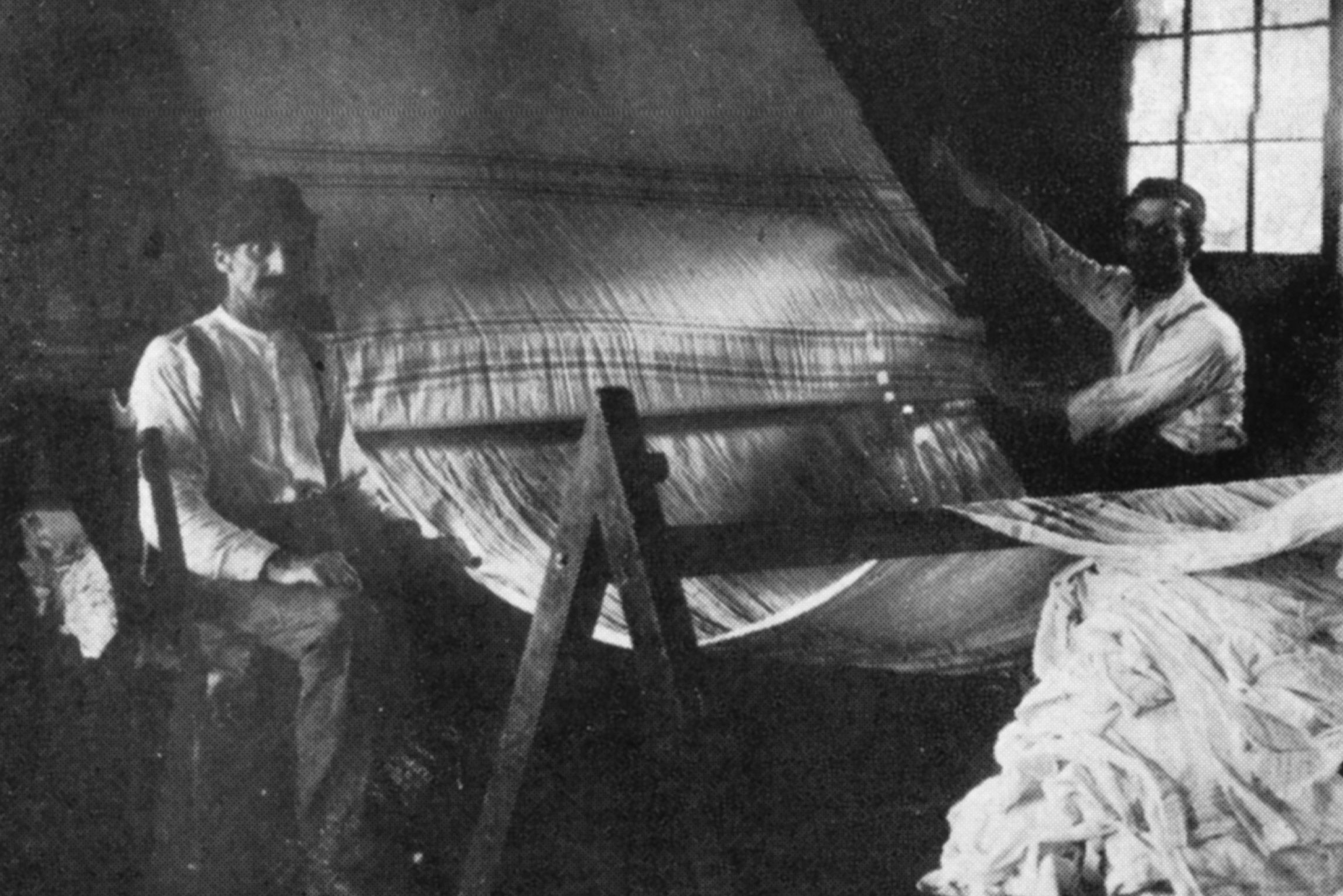 Men at a loom
