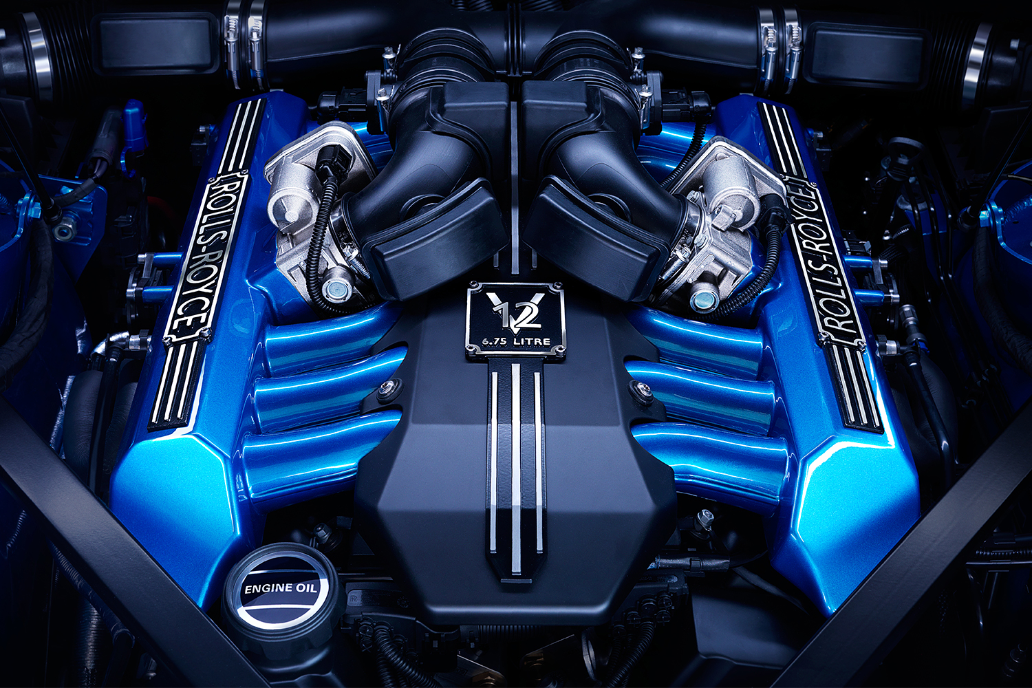 <strong>Engine</strong><br>“I once heard someone define luxury as ‘more than enough.’ That’s a perfect description of the hand-assembled 6.75-liter, twin turbocharged V12 engine that’s in every Rolls-Royce. Specifically tuned for use in each vehicle, the engine is the main reason the company describes the performance of its cars as effortless. What struck me as I saw this behemoth of an engine outside the car was just how artistically put together it is.” — Briggs