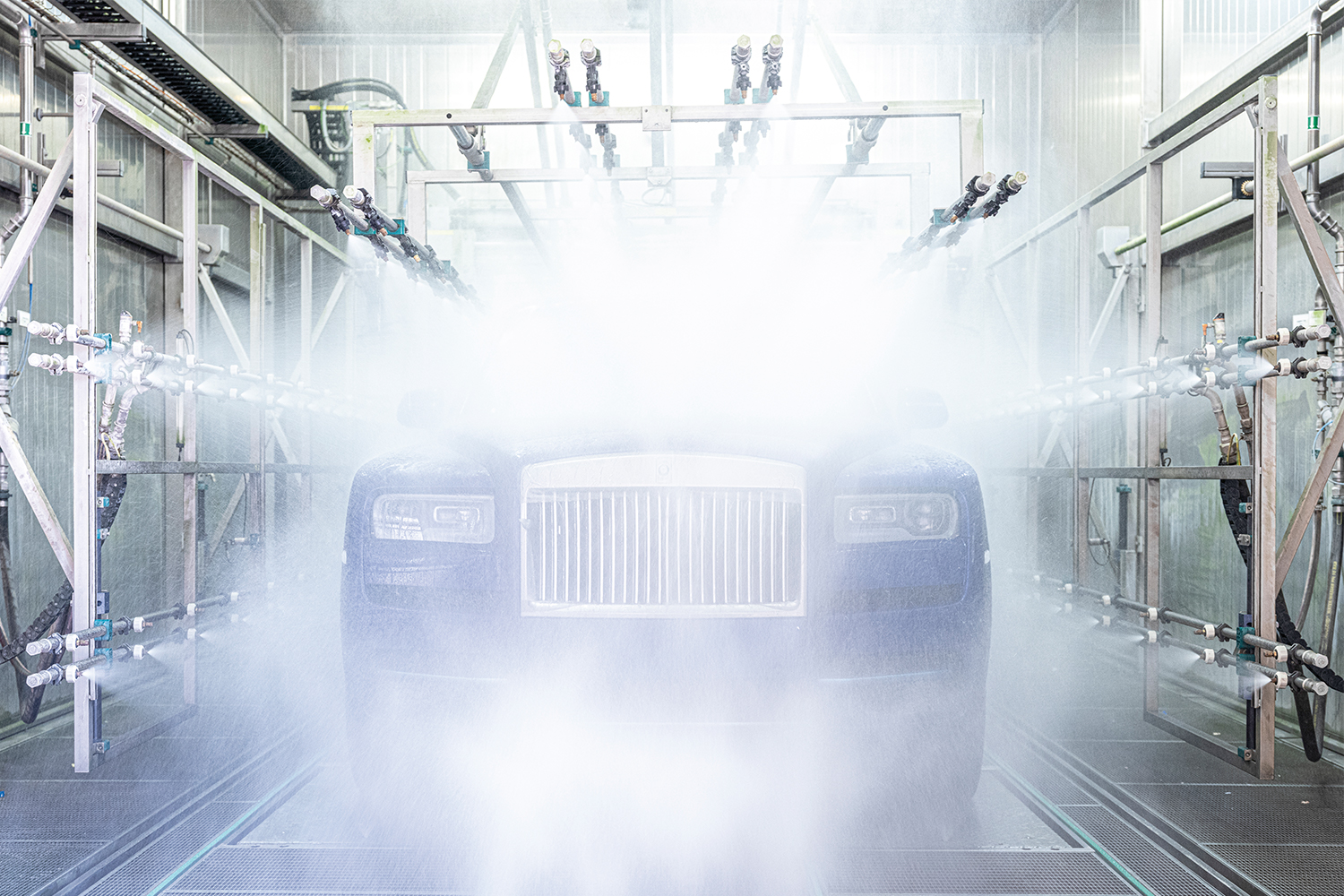 <strong>Water Testing</strong><br>“Like seemingly everything in the Rolls-Royce manufacturing center, the water testing chamber is custom made to simulate all different types of rainfall, from gentle spring showers to the monsoons that regularly strike South Asia. Watching the Cullinan go through this process I started thinking about all the water that’s used and was pleased to discover they recycle it all, regularly testing its pH and treating it before the cycle begins again.” — Briggs