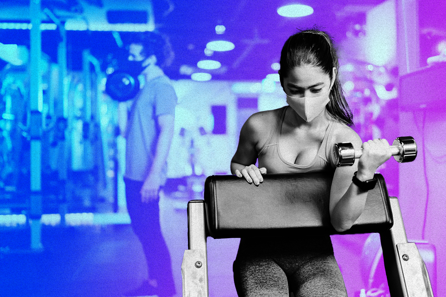 A woman kicking a man at the gym.