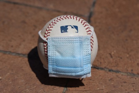 MLB baseball with a COVID mask