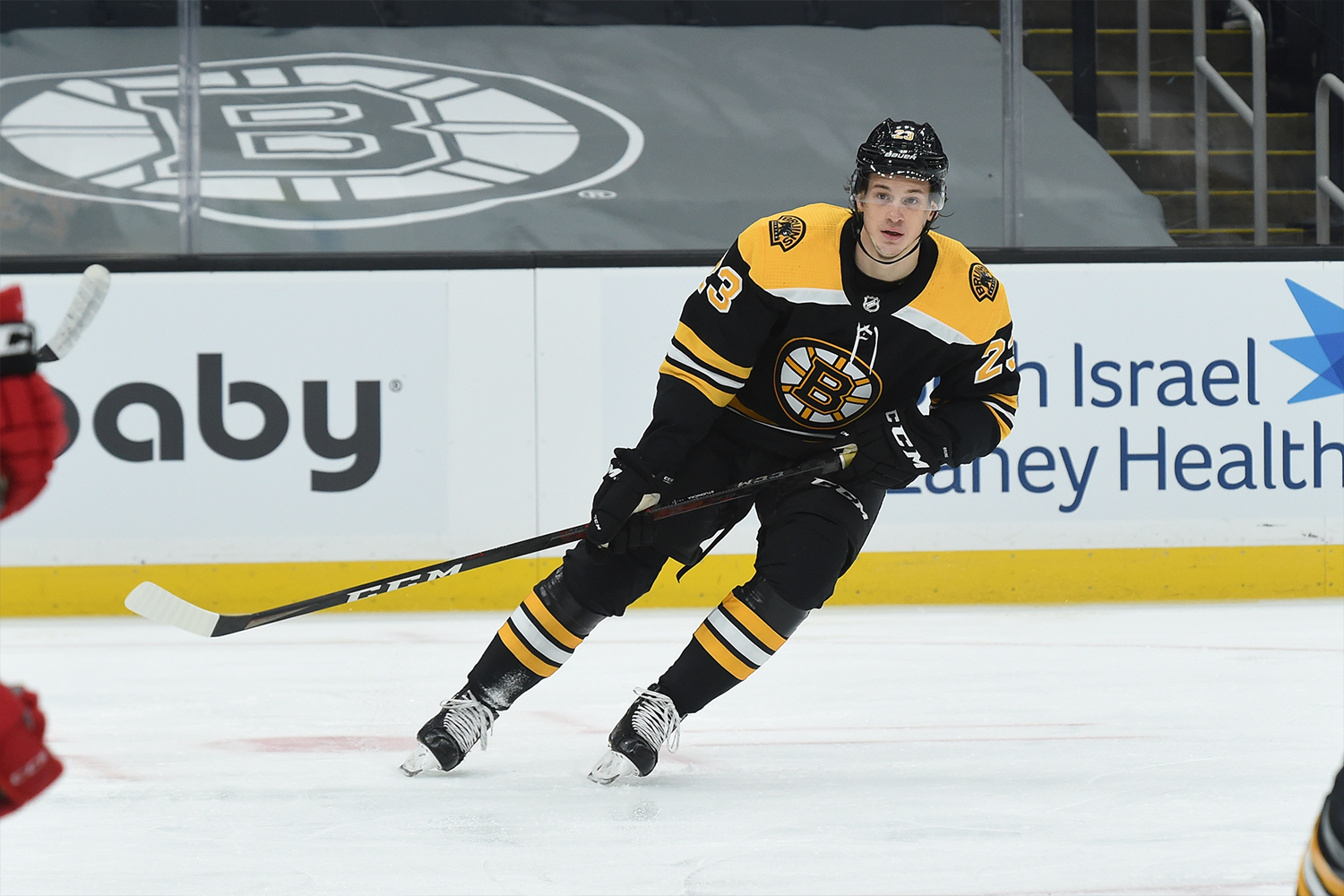 Jakob Forsbacka Karlsson #23 of the Boston Bruins skates against the New Jersey Devils at the TD Garden on March 28, 2021
