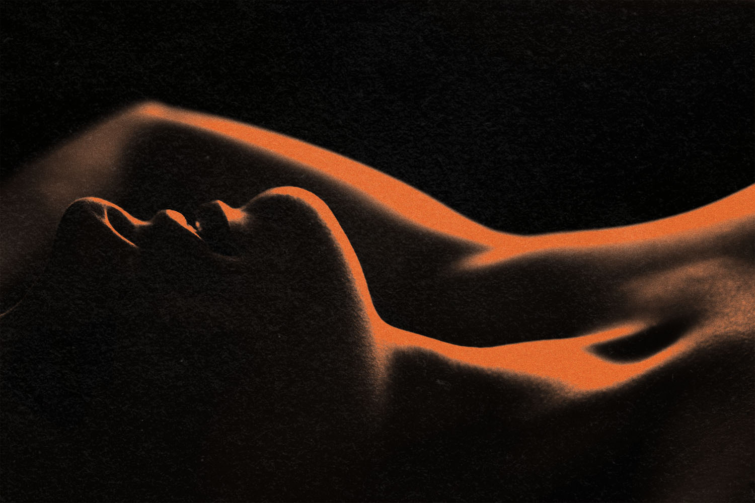close-up of a woman's side profile lying in bed