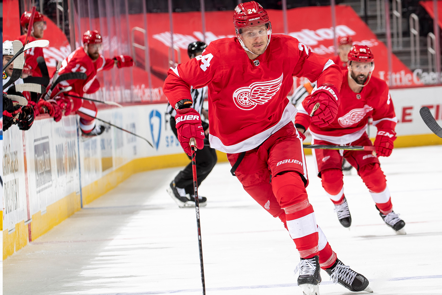 Richard Panik #24 of the Detroit Red Wings skates after a loose puck against the Chicago Blackhawks during an NHL game at Little Caesars Arena on April 17, 2021