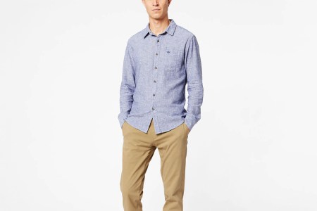 A man wearing the Ultimate Chinos by Dockers, now on sale at 40% off