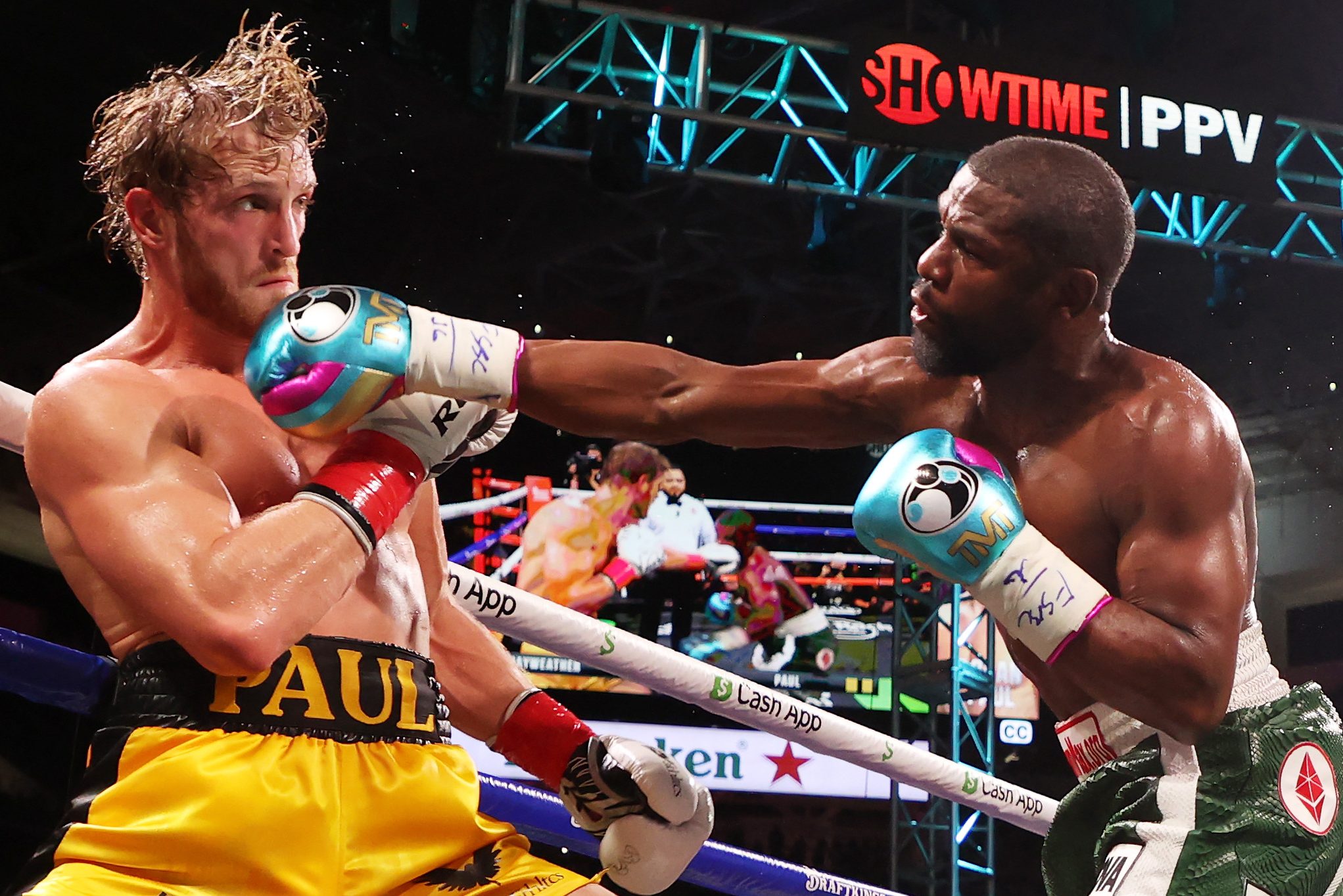 Floyd Mayweather punches Logan Paul