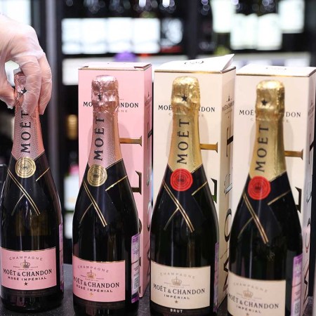 Moet Hennessy sparkling wines on sale in a supermarket. On July 2, 2021, President Vladimir Putin signed a new law allowing the term champagne to be used only for the sparkling wines produced in Russia and requiring all non-Russian producers, including the French, to add the sparkling wine label on the back of the bottles delivered to Russia. The French champagne maker Moet Hennessy suspended deliveries to Russia due to the new law, though later agreeing to add the sparkling wine label and to resume deliveries in compliance with Russias new legislation.