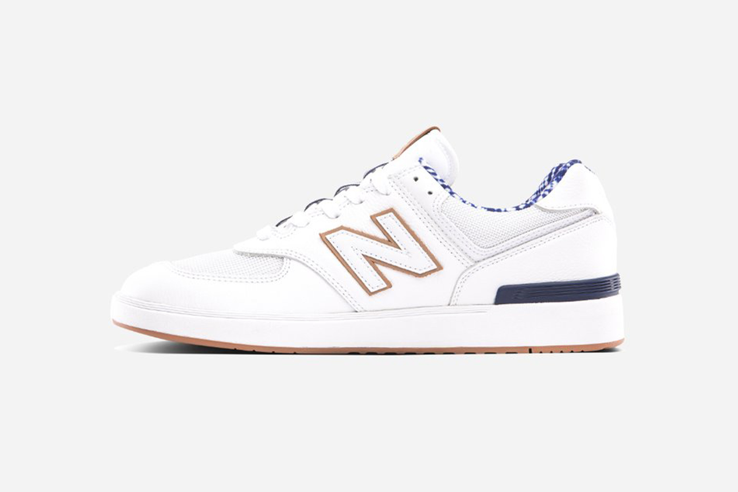 The new sneaker from New Balance and Slowtide. The beachy collaboration extends to slides and towels too.