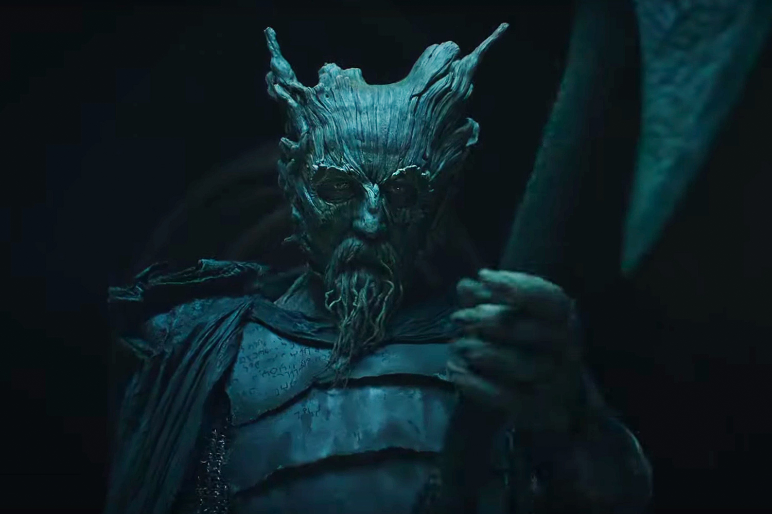 The Green Knight, facing Sir Gawain as played by Dev Patel, in the new David Lowery movie. The original tale was a favorite of J.R.R. Tolkien.