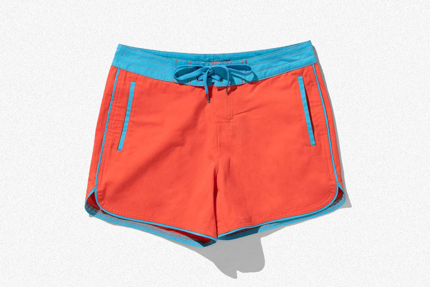 Organic Throwback Board Shorts from United by Blue in coral and blue