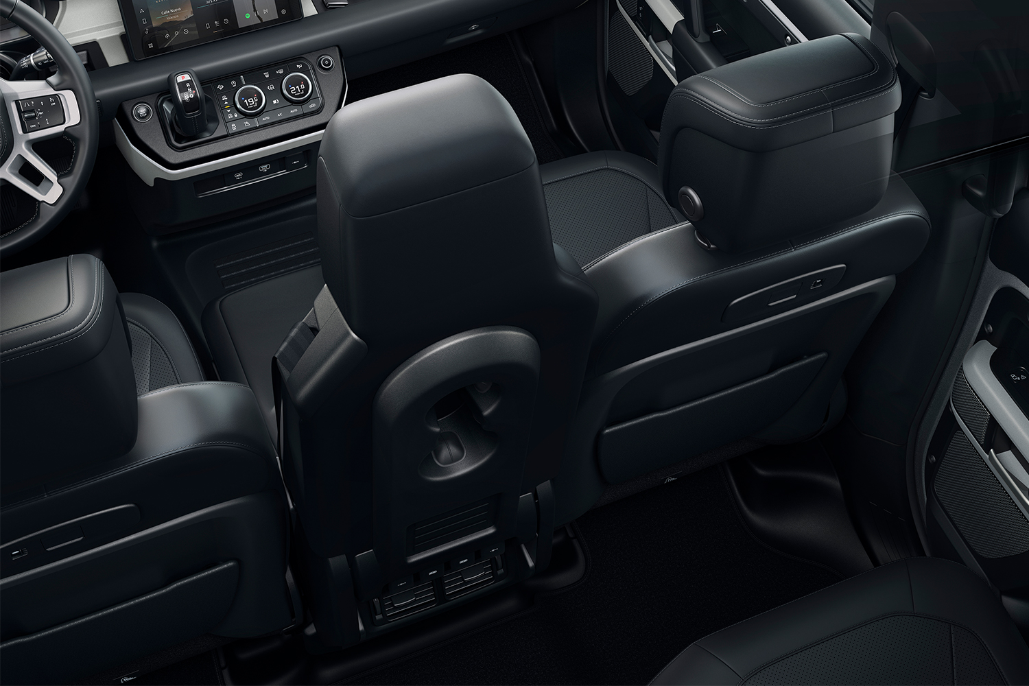 The available folding front jump seat in the 2021 Land Rover Defender 90 luxury SUV. After reviewing the vehicle, we think it would be a little too tight with the option.