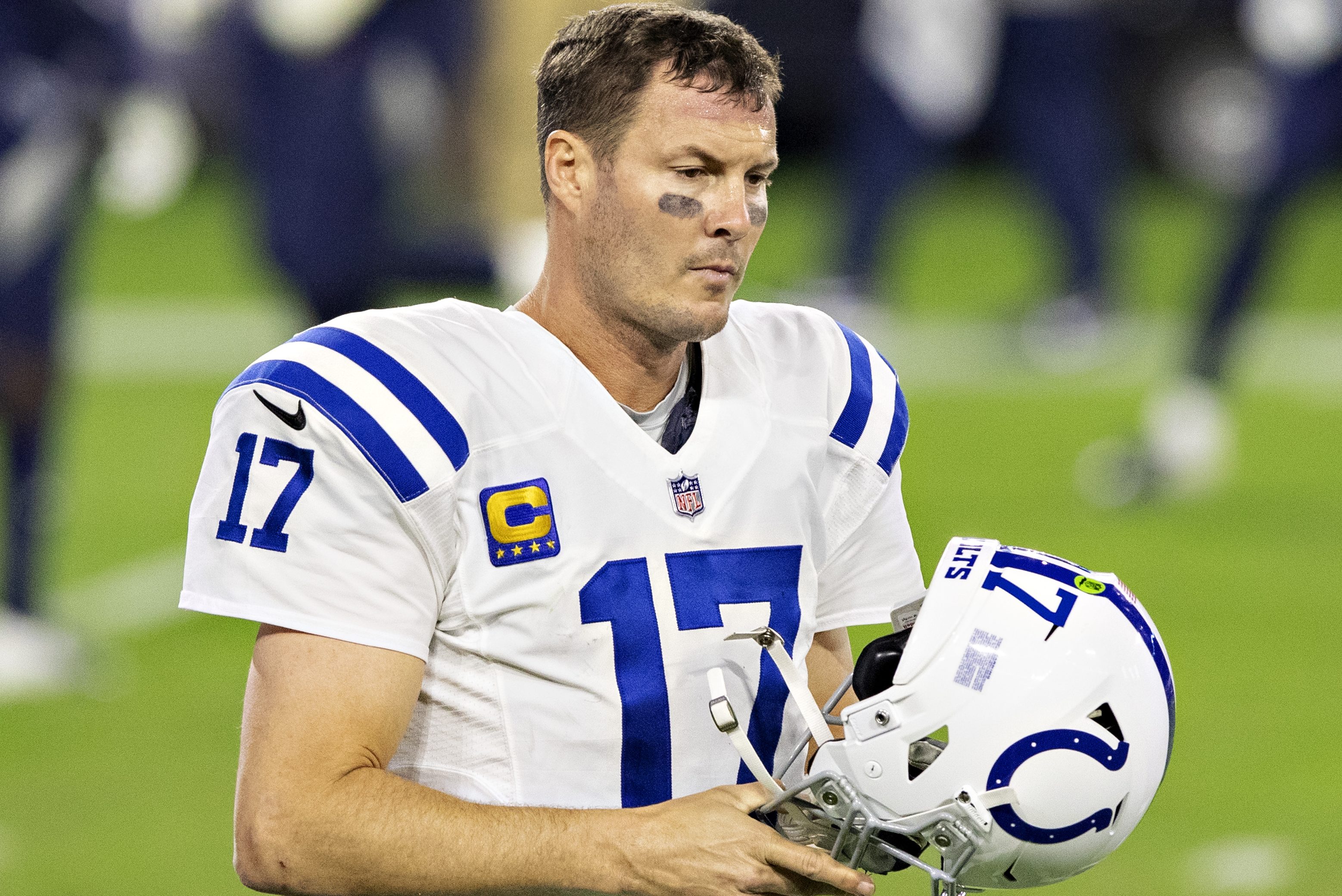 Philip Rivers walks off the field during the 2020 season. The QB has hinted at a comeback.