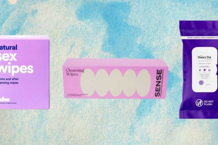 Three after-sex clean-up wipes on a blue background