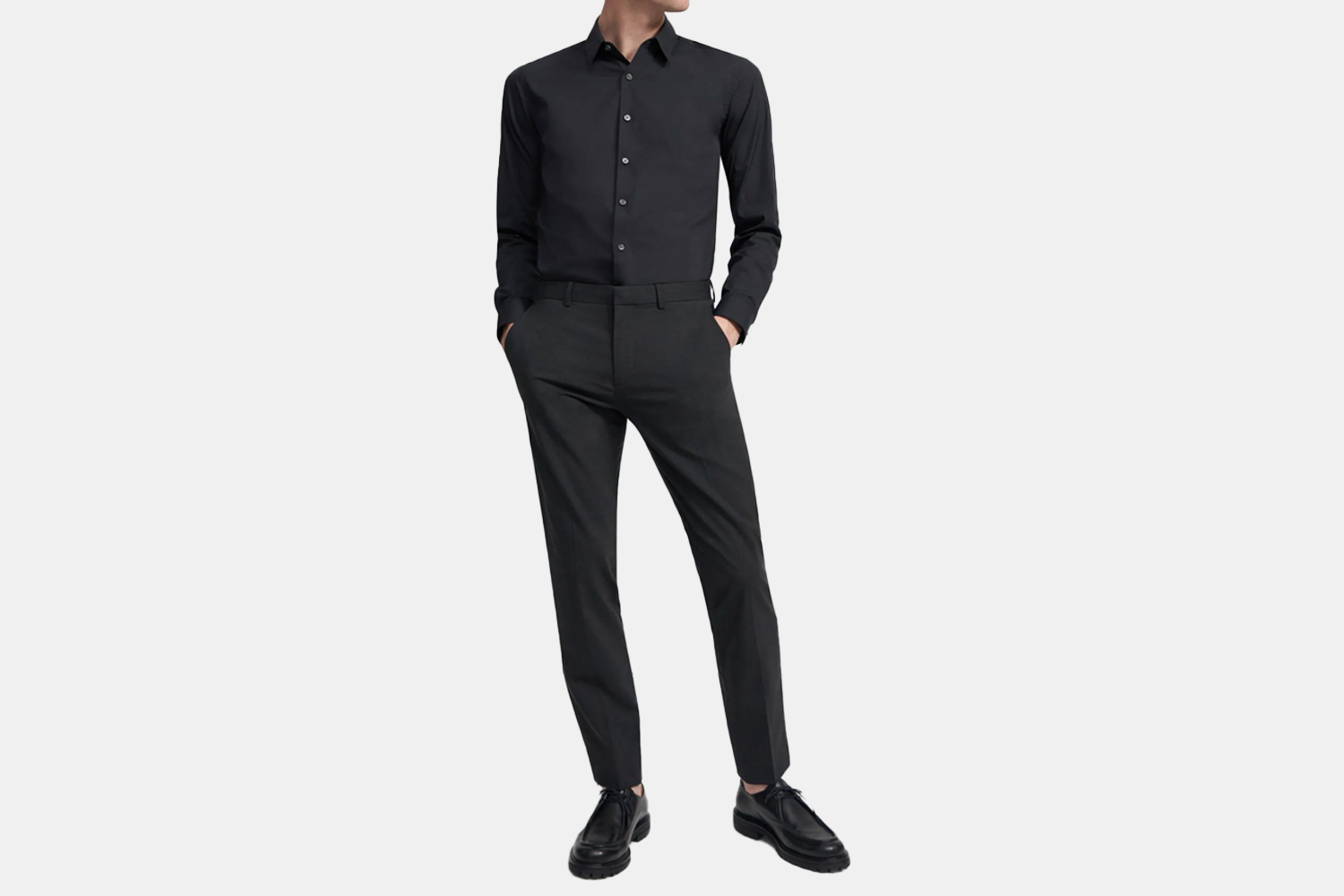 a model in an all black outfit.