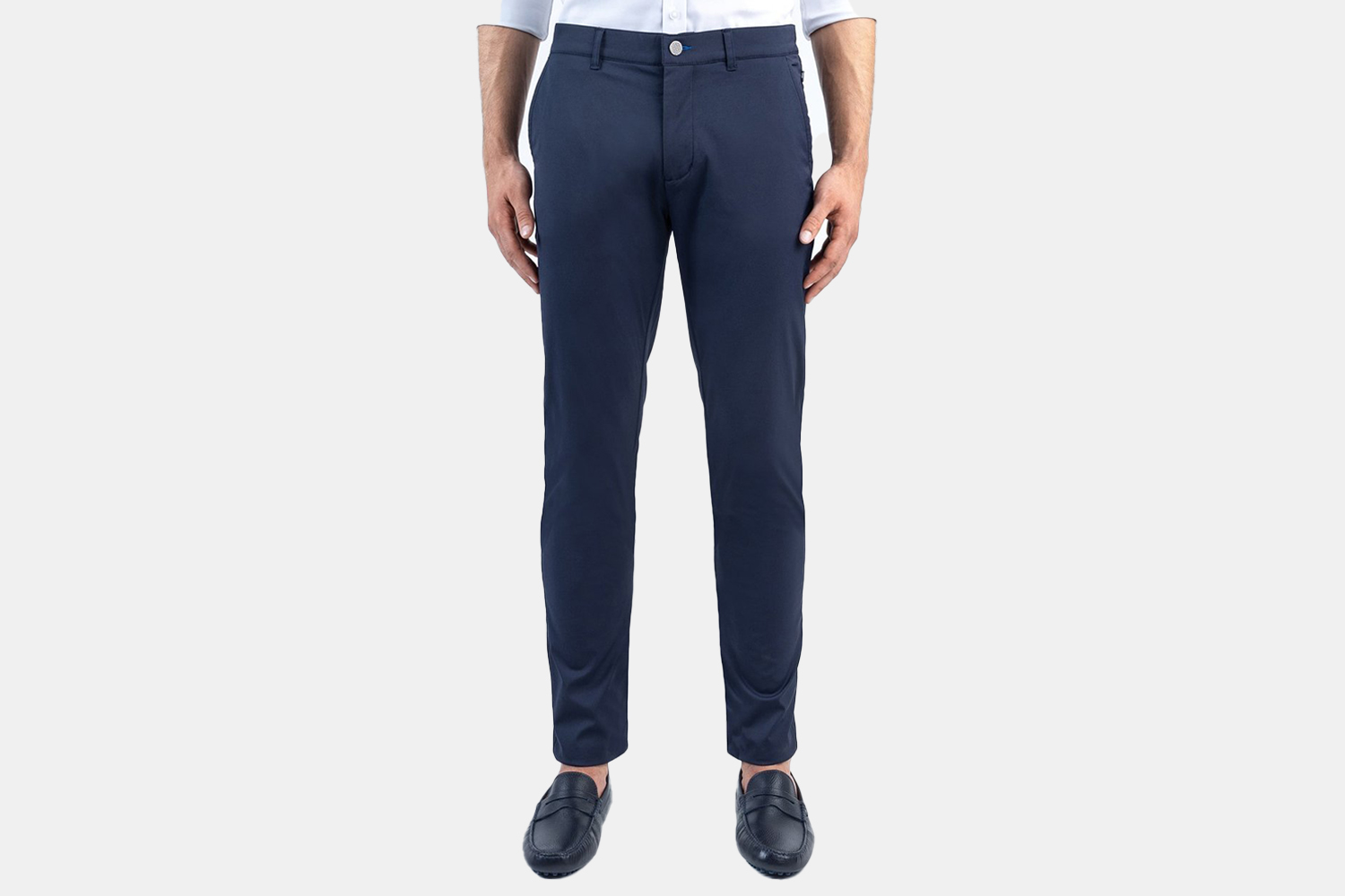 a pair of navy pants on a model.