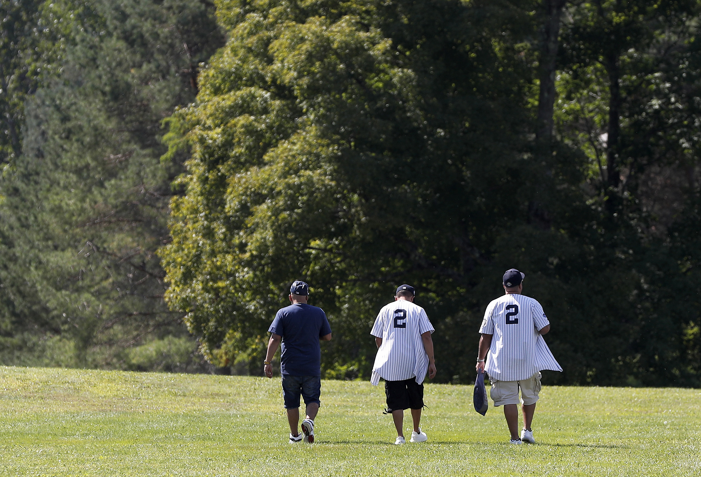 Fans in Derek Jeter jerseys make their way to Hall of Fame induction ceremony on September 8, 2021