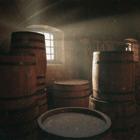 whisky aging in barrels in a dusty warehouse. Aging whisky for a long time (50+ years) presents unusual challenges.
