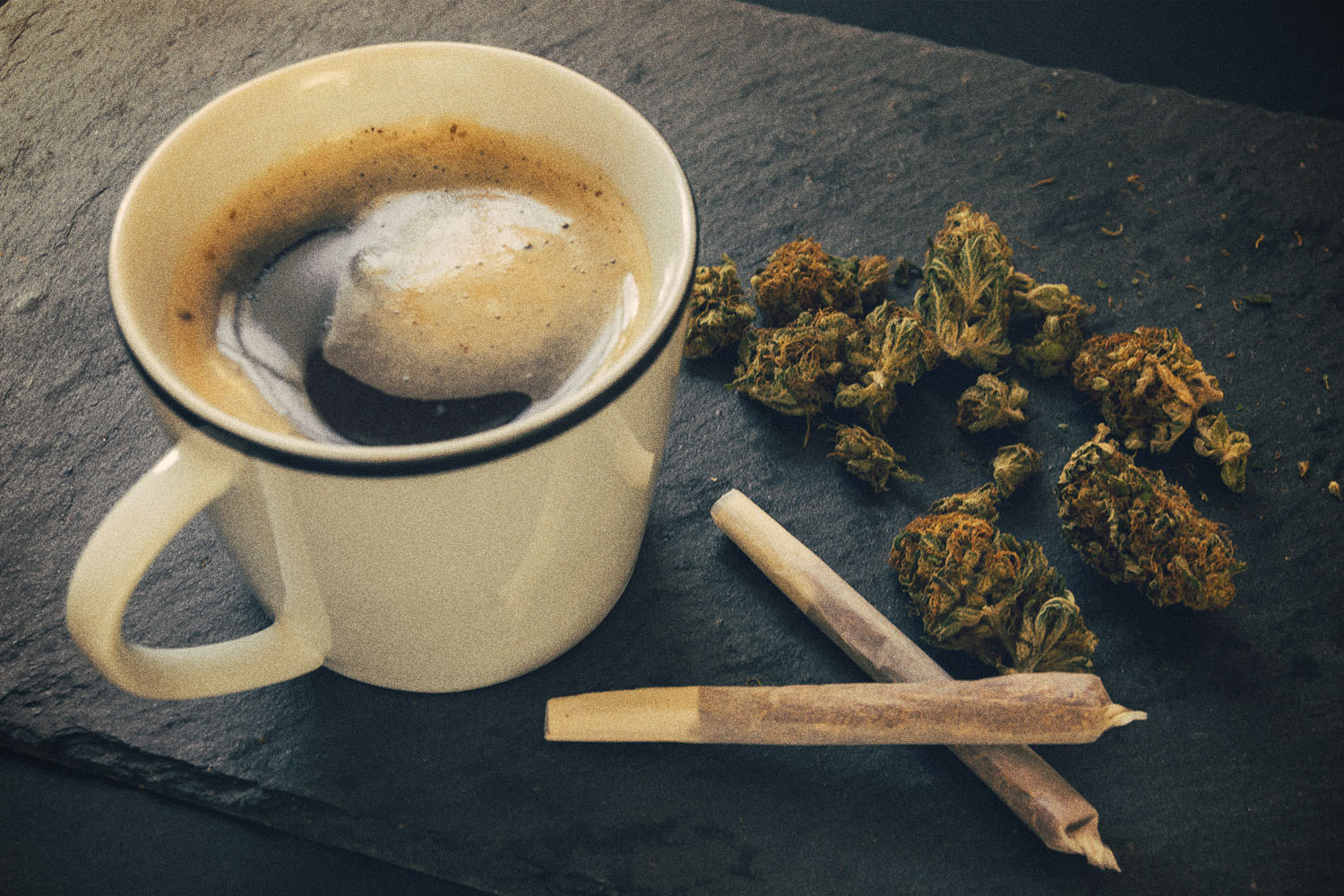 A cup of coffee, two joints and some loose cannabis. Weed and caffeine can work well together, according to some experts