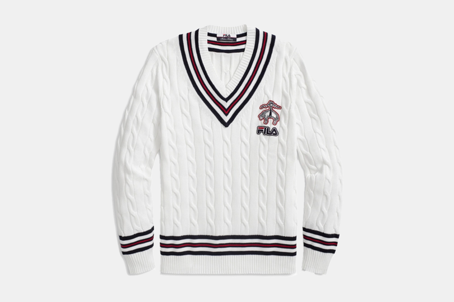 a cable knit white seater