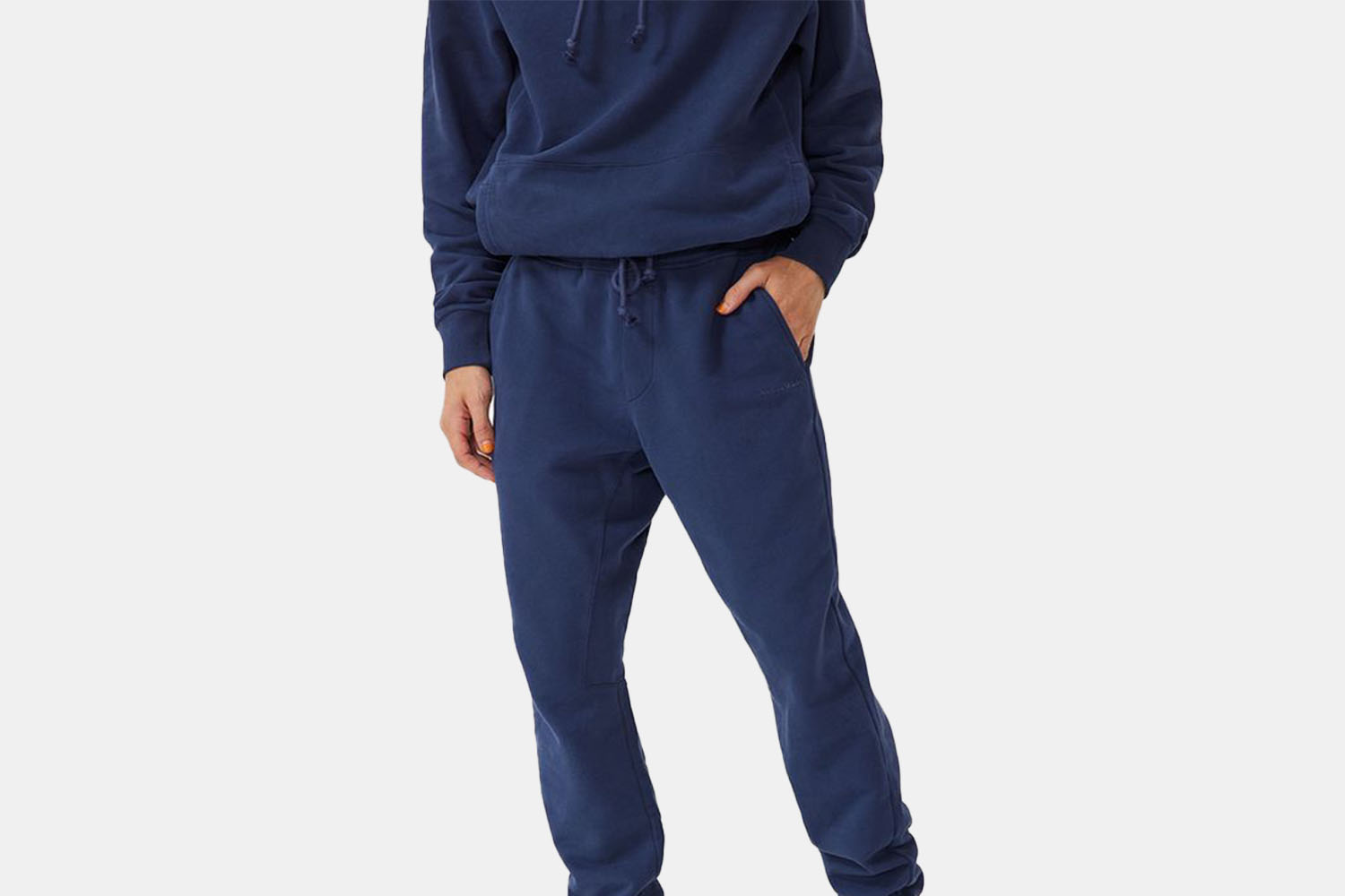 a model in a blue sweatsuit