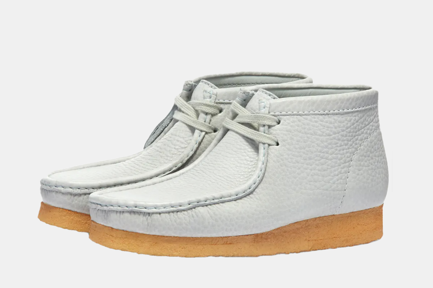 a tall baby blue wallaby boot
