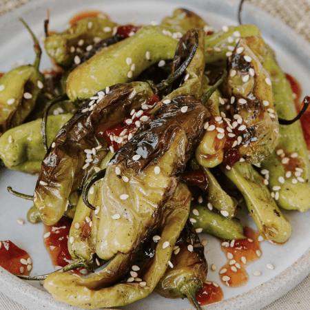 Blistered shishito peppers made with Red Clay conserve