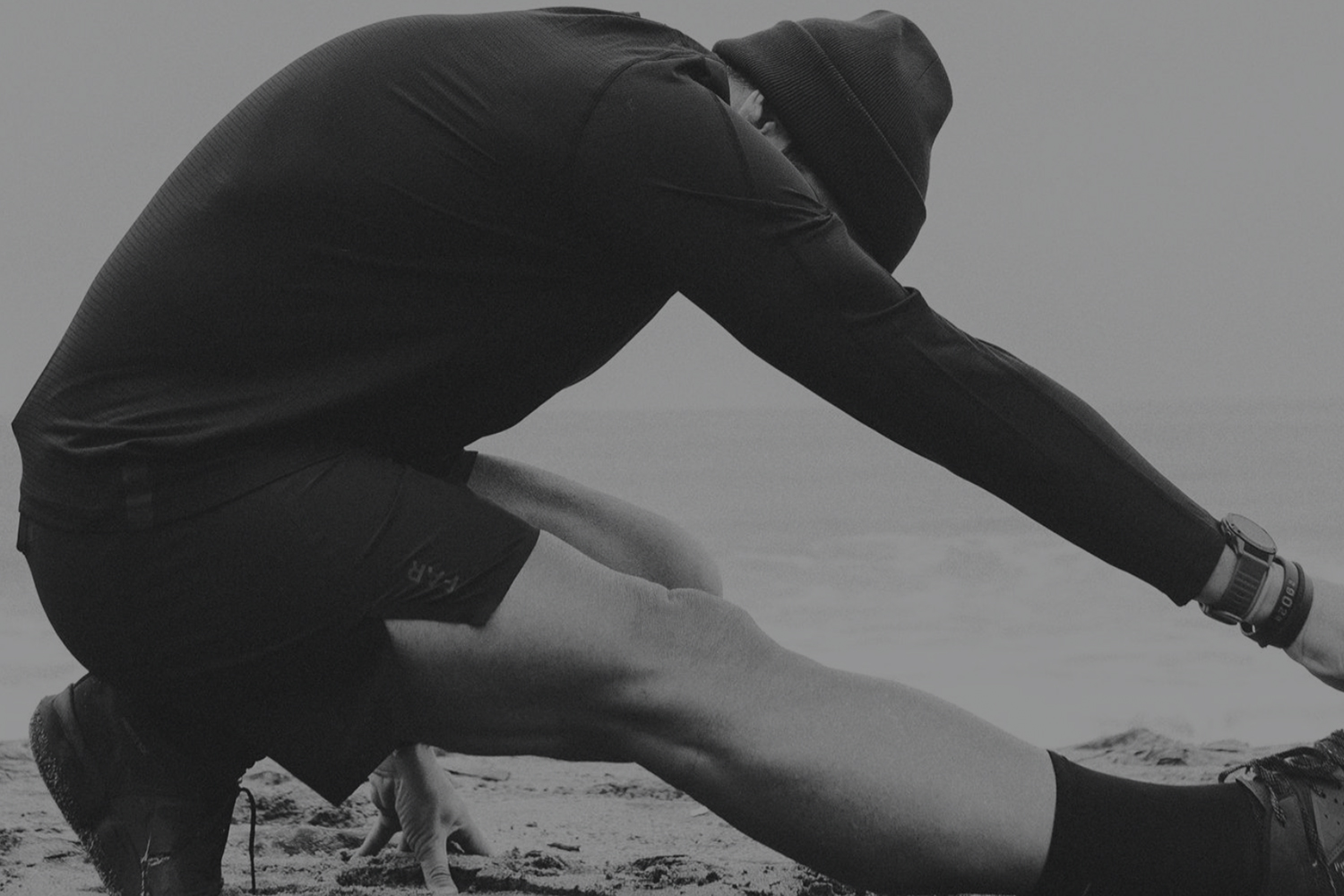 a runner stretching