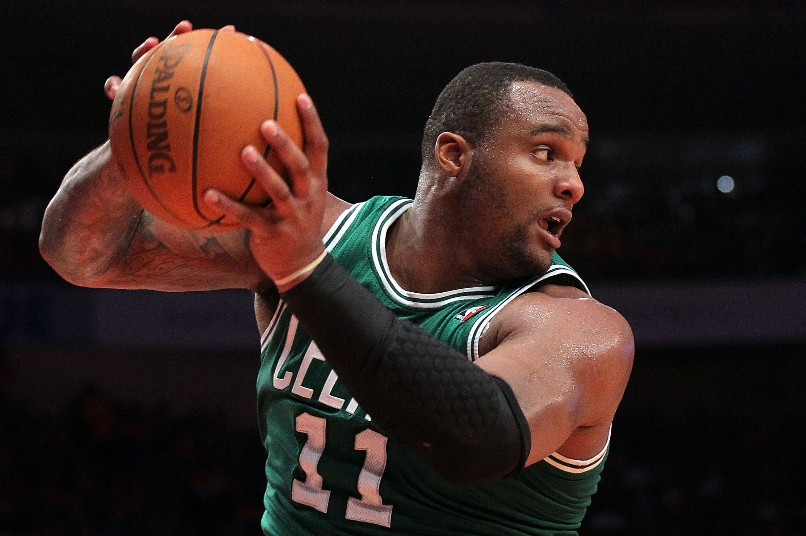 Former Celtic Glen Davis controls a rebound during the 2011 NBA playoffs