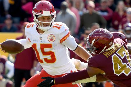 Patrick Mahomes runs with the ball