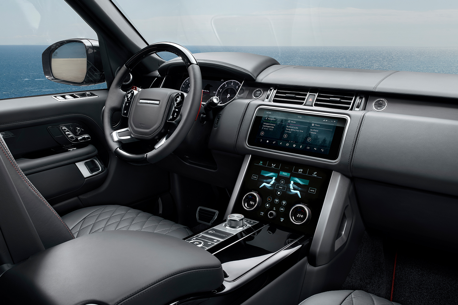The interior of the 2021 Range Rover SUV, showing the rotary gear selector